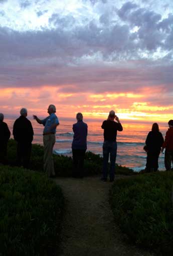 Joe Jordan with students at sunset